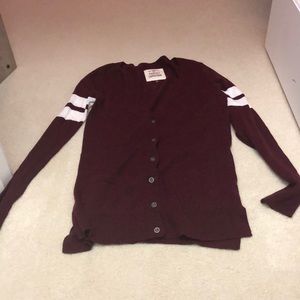 Red button up cardigan.